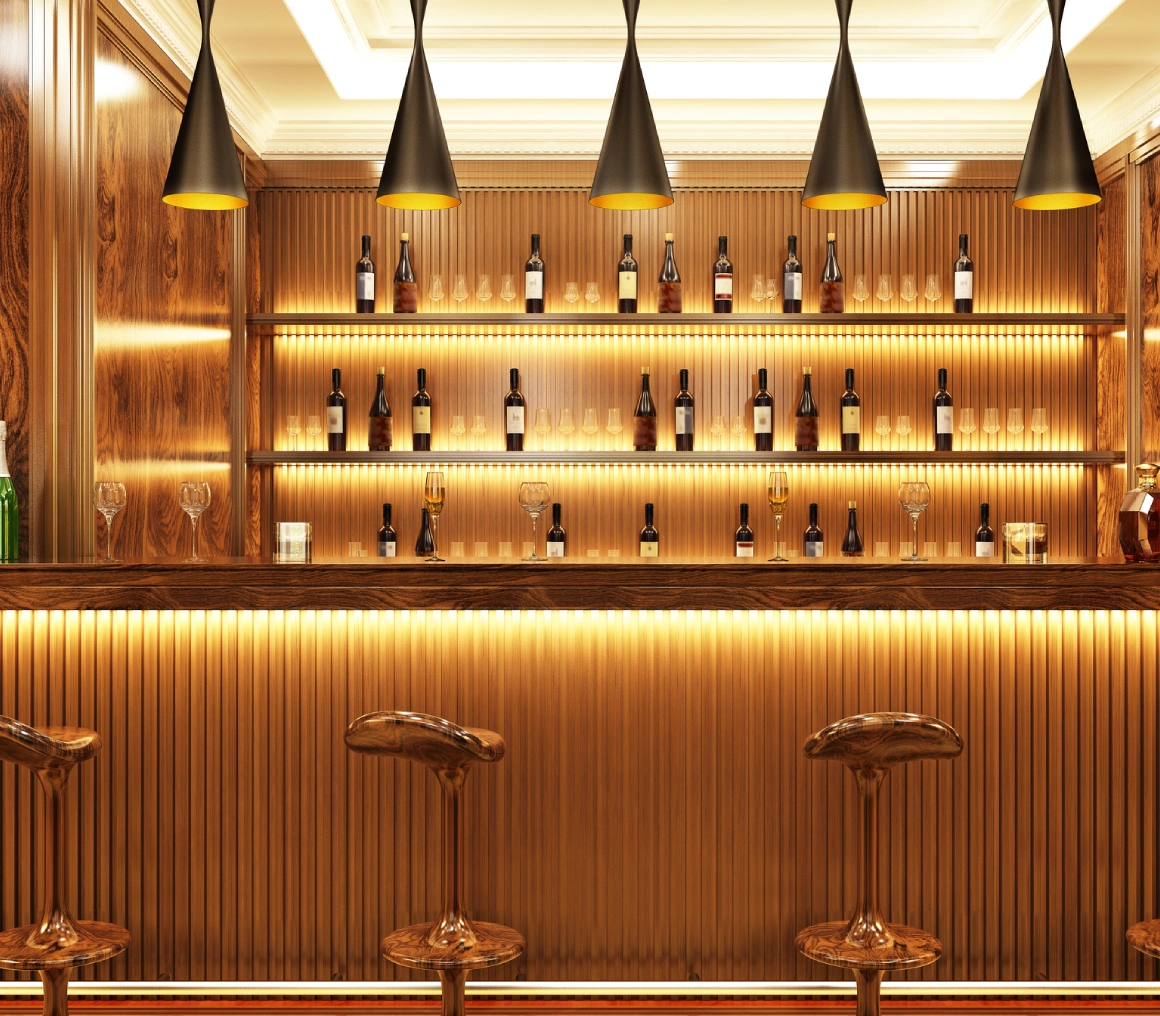 Elegant wooden bar with stylish stools and warm lighting.